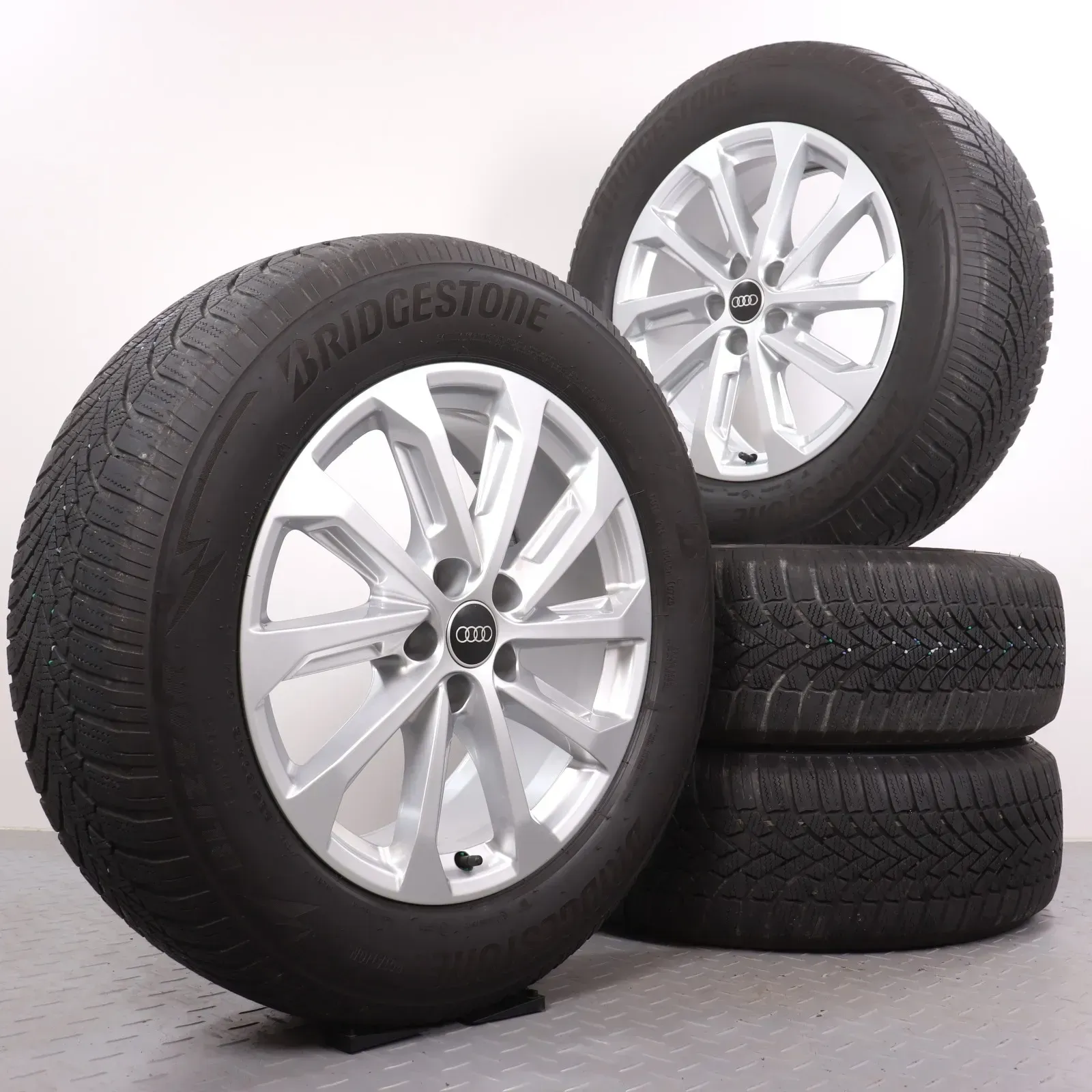 Winterräder 18 Zoll Audi Q5 GU Original Felgen 8MA601025Q Winterreifen DOT25 5 & 6mm 235/60R18 107H XL R0 Bridgestone Blizzak LM-005 10-Speichen silber 7x18ET34 - Bild 1