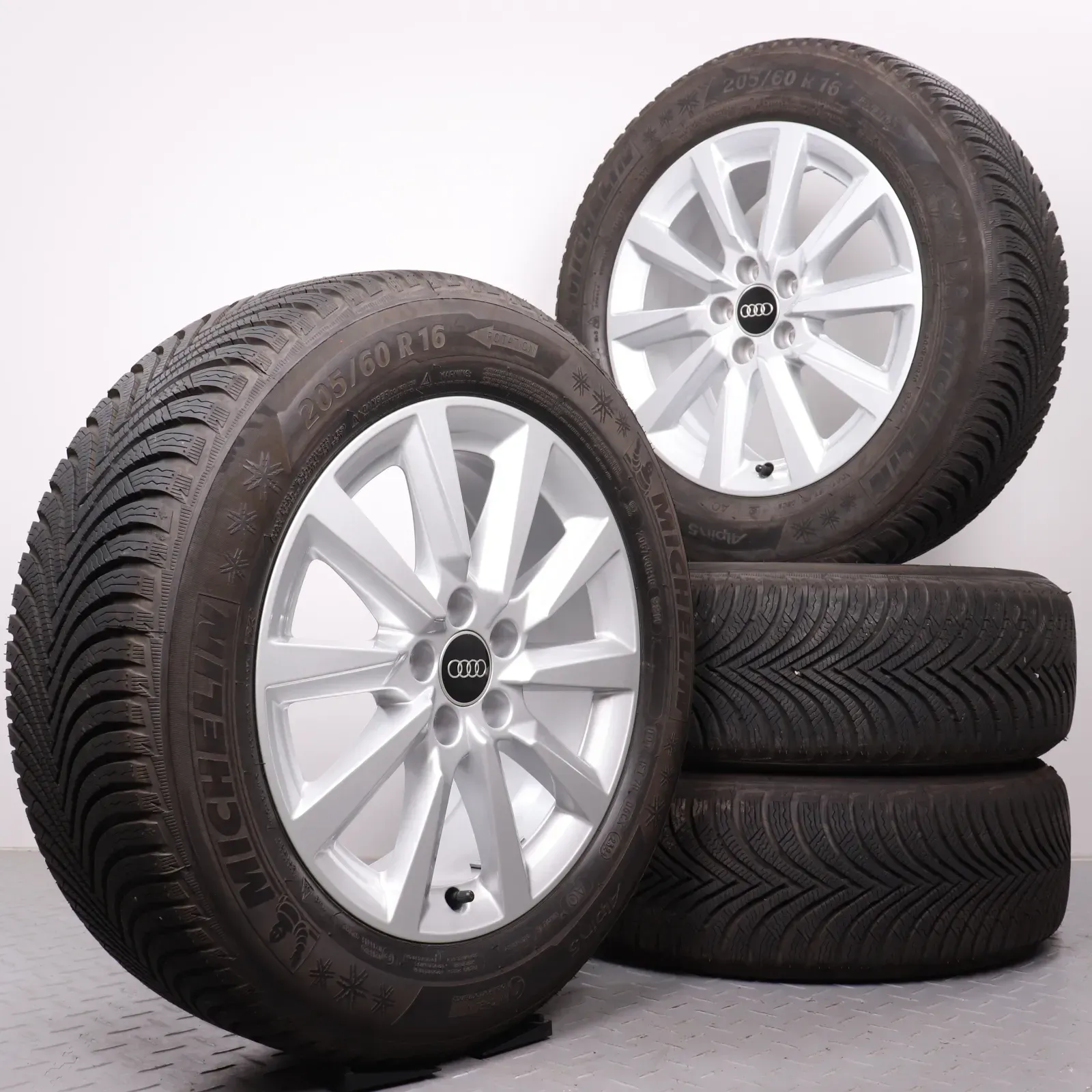 Winterräder 16 Zoll Audi A1 CityCarver / Allstreet Original Felgen 82A601025C Winterreifen DOT24 7,5-8mm 205/60R16 92H AO Michelin Alpin 5 10-Speichen Design silber 6,5x16ET40 - Bild 1