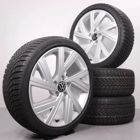 Background image for Winterräder 18 Zoll VW Golf 8 CD Original Felgen 5H0601025AB NEU DEMO DOT23 Winterreifen 225/40R18 92V XL AO Bridgestone Blizzak LM005 Bergamo silber 7,5x18ET51 5x112