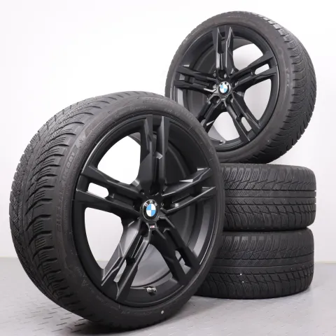 Background image for Winterräder 18 Zoll BMW 1er F40 2er Gran Coupe F44 Original Felgen Styling 556M schwarz matt 8053524 Winterreifen Bridgestone 225/40R18 92V XL * RSC Runflat 5mm DOT19